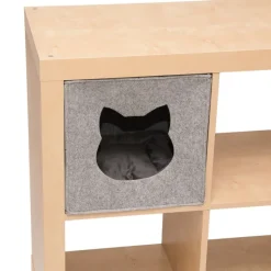 Huopamaja kirjahyllyyn