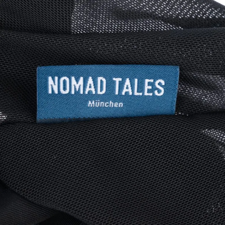 Nomad Tales -kärpäshuppu korvilla, musta